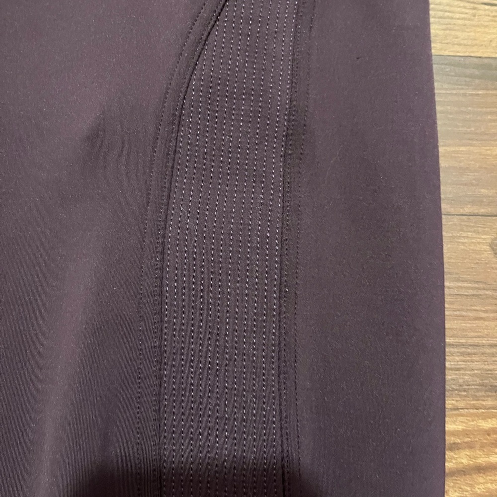 Lululemon Fast As Fleece Tight
Black Cherry Womens Size 4
Reflective Pocket - Picture 14 of 14
